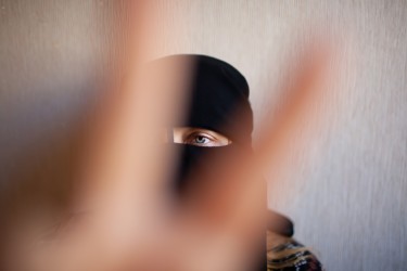 blurred photo of a woman in burqa